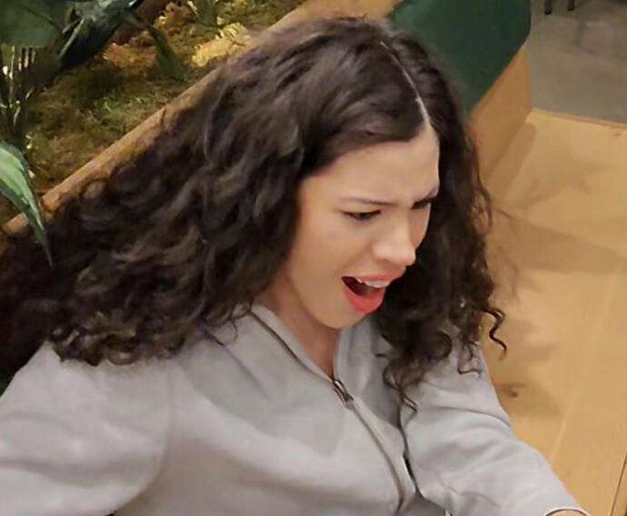 Young lady cannot believe what she just saw